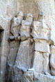 Anonymous threatening figures on Passion Facade at Sagrada Familia. Barcelona, Spain.
