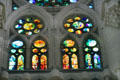 Stained glass windows over charity portal at Sagrada Familia. Barcelona, Spain.