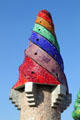 Gaudi's mosaic colored spiral chimney atop Palau Güell. Barcelona, Spain.
