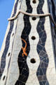 Figure of lizard on chimney atop Palau Güell. Barcelona, Spain.