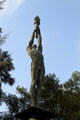 Sculpture of athlete holding Olympic torch on Montjuïc. Barcelona, Spain.