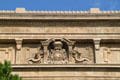 Crest on facade of Palau Nacional on Montjuïc hill. Barcelona, Spain.