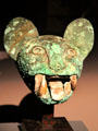 Gold & copper feline head from Mochica Culture, Peru at Barbier Mueller Precolumbian Art Museum. Barcelona, Spain.