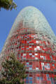 Red facade of Torre Agbar. Barcelona, Spain.