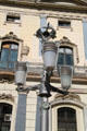 Lampstand in front of Old Customs House. Barcelona, Spain.