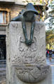 Statue of boy holding frog by Josep Campeny i Santamaria. Barcelona, Spain.