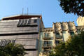 Casa Llorenç Armengol beside modern building. Barcelona, Spain.