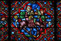 Stained glass window of flight into Egypt in Cathedral St. Étienne. Auxerre, France.