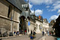 Street facade of Hotel Dieu kept plain so as not to attract thieves. Beaune, France.