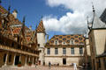 St. Louis wing in courtyard of Hotel Dieu. Beaune, France.
