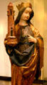 Wooden statue of St Barbara with her tower from upper Rhine in Unterlinden Museum. Colmar, France.