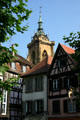 Half-timbered houses & tower of St. Martin church. Colmar, France.