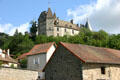 La Rochepot chateau on hill above town in Burgundy Wine Region. La Rochepot, France.