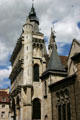 Gallery facade of Notre Dame church showing three tiers of gargoyles. Dijon, France.