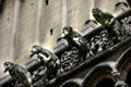 Pig, sheep & people gargoyles on Notre Dame church. Dijon, France