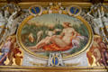 Oval painting of naked nymph with two dogs in François I gallery in Fontainbleau Palace. Fontainbleau, France.