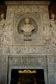 Fireplace with bust of Henri IV in guard room of Fontainbleau Palace. Fontainbleau, France.