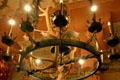 Chandelier with antlers & game profiles in Haut Koenigsbourg. France.