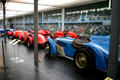 Antique racing cars arranged at starting line in Schlumpf National Automobile Museum. Mulhouse, France.