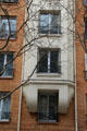 Detail of Art Deco apartment building beside Le Carreau du Temple. Paris, France.