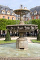 Place des Vosges fountain by Cortot. Paris, France.