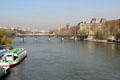 Pont des Arts bridge over Seine connecting Institut de France & Louvre. Paris, France.