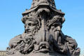 Base of lamp post on Pont Neuf with faces & dolphins. Paris, France