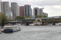 Seine River with Pont de Bir-Hakeim & Grenelle area tower residences. Paris, France.