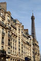 Residential buildings in 16th arrondissement with Eiffel Tower beyond. Paris, France.