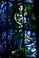 Stained glass Virgin Mary carrying baby Jesus by Marc Chagall in Cathedral. Reims, France.