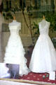 Bridal gowns in shop window. Reims, France.