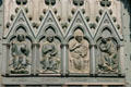 Bronze panel of central door of Cathedral showing Christ, Peter , Paul & archangel Michael. Strasbourg, France.