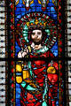Detailed stained glass portraits of Devicus Rex in Cathedral. Strasbourg, France.