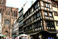Half-timbered buildings on rue Mercier leading to Cathedral. Strasbourg, France.