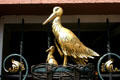 Metal stork & baby sign in Alsace. France.