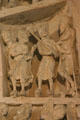 Narthex tympanum detail of Armenians wearing clogs at Basilique Ste-Madeleine. Vézelay, France.