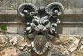 Horned grotesque face in grottos of Vaux-le-Vicomte chateau. Melun, France.