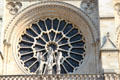 Rose window exterior of Notre Dame Cathedral. Paris, France.