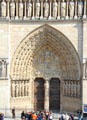 Center Gothic portal of Notre Dame Cathedral. Paris, France.