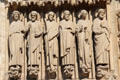 Saints carvings on center portal of Notre Dame Cathedral. Paris, France.