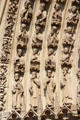 Saints carvings on left portal of Notre Dame Cathedral. Paris, France.