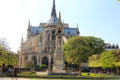 Gothic rear structure of Notre Dame Cathedral with flying buttresses. Paris, France.