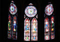 Apse stained glass window in Notre Dame Cathedral. Paris, France.