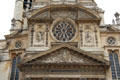 Rose window in post-Gothic facade on St-Étienne-du-Mont church. Paris, France.