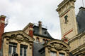 Chimney & pediments with scientific discipline plaques on rue St-Jacques at Sorbonne University. Paris, France.