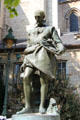 Sculpture of ceramic artist Bernard Palissy near Sevres Arch at St-Germain-des-Prés. Paris, France.