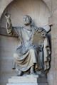 St Peter statue in niche of west portal at St-Sulpice church. Paris, France.