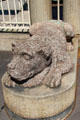 Sculpted dog guarding gates at Mobilier National workshops. Paris, France.