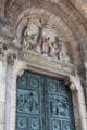 Crucifixion scene over bronze doors of Basilica of Sacred Heart on Montmartre. Paris, France.