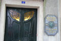 Art Nouveau door on building in which artist Maurice Neumont lived & died at Montmartre. Paris, France.
